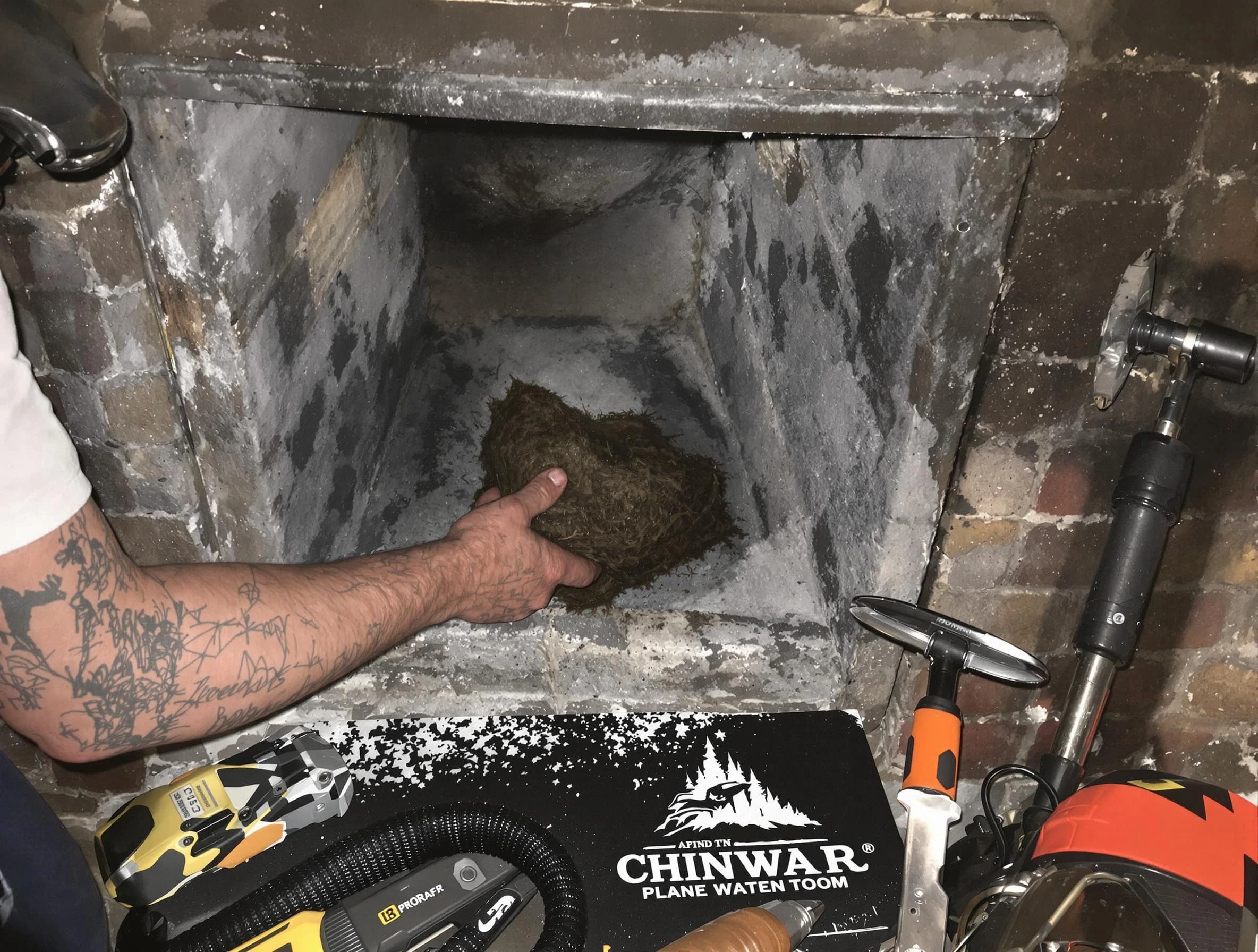 Union Chimney Sweep safely removing debris and screening chimney in Union, NJ